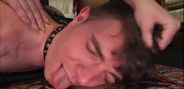 Busty dominatrix pegging submissive man